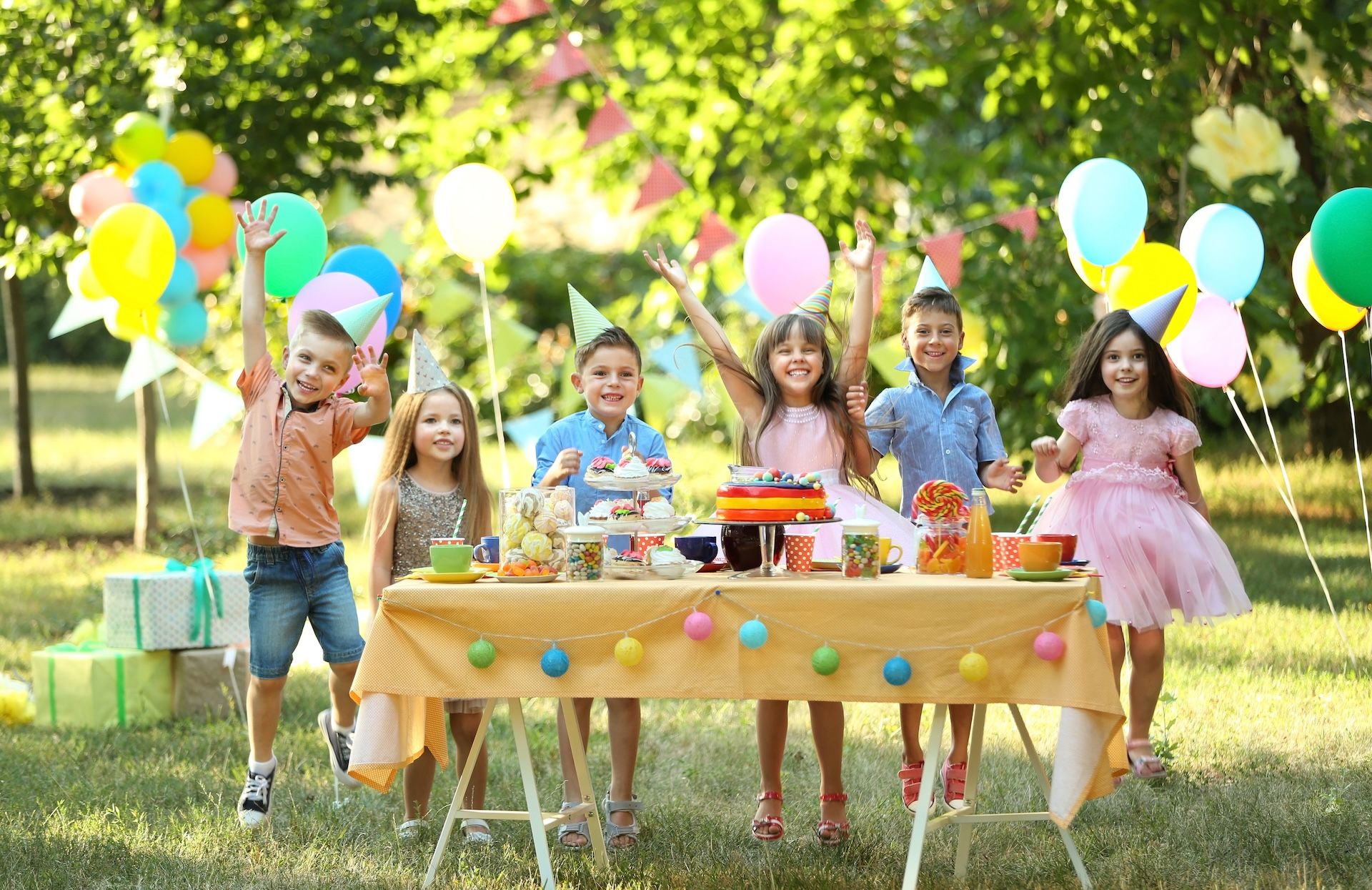 Happy kids celebrating a birthday party
