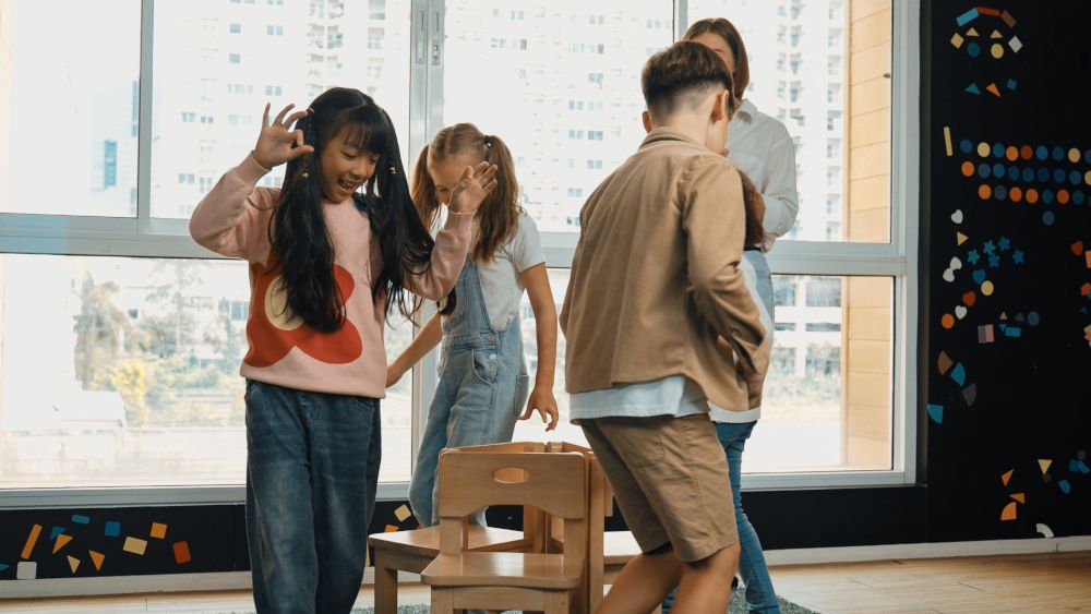 Kids playing musical chairs at a birthday party