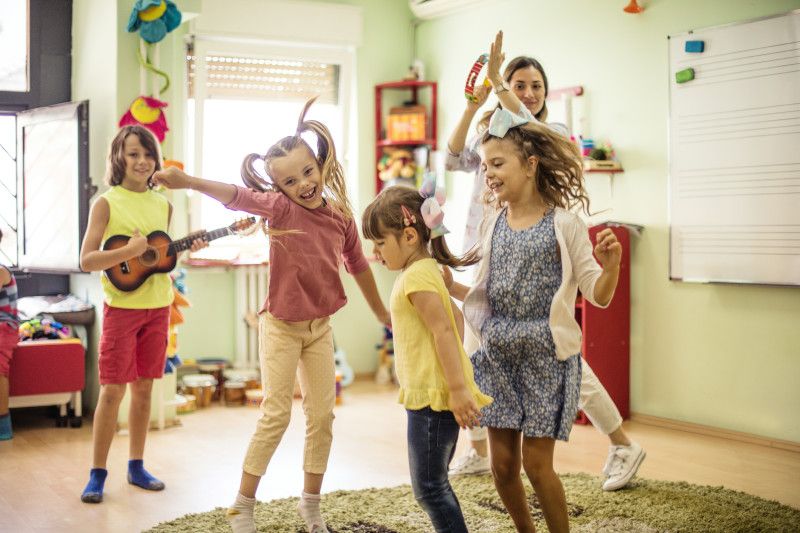 Kids performing a mini play in homemade costumes